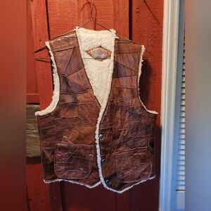 Leather and sheepskin vest men's small. Women's medium.